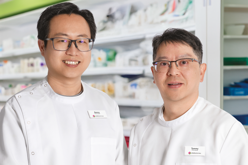 Watsons pharmacy team members collaborating in a positive, professional environment